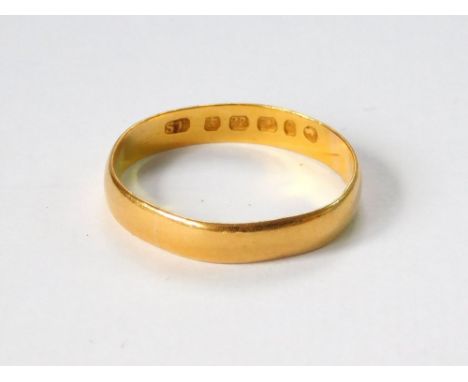 GOLD BAND. A 22ct. gold wedding band, Birmingham 1881. Approx. 2.7g. Condition Report: A little thin, a little out of true.  