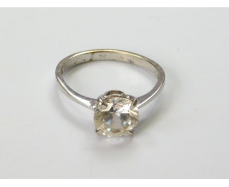 DRESS RING. A 9ct. white gold dress ring, set a large colourless stone. Size T. Approx. 3.5g. Condition Report: Good.  Please