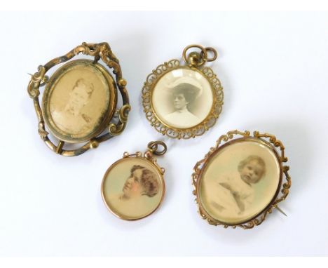 PHOTO LOCKETS ETC. A 9ct. gold photograph locket, with two tinted portraits, one other pendant/locket with two Edwardian phot