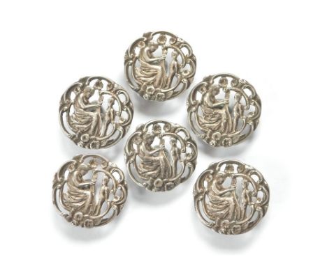 BUTTONS. A set of silver plated, cast metal, early 20th century buttons, St. Cecilia & her harp, with a small cupid looking o