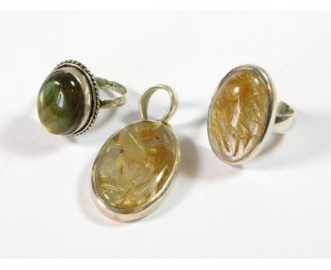 SILVER RINGS ETC. A silver dress ring, set a rutilated quartz stone & a similar silver pendant drop. Also, a silver ring set 