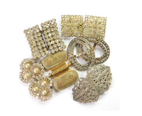 BUCKLES. Two 20th century paste-set, two-part buckles & three other paste buckles. Largest oval buckle, 7.5 x 7.5cm. Conditio