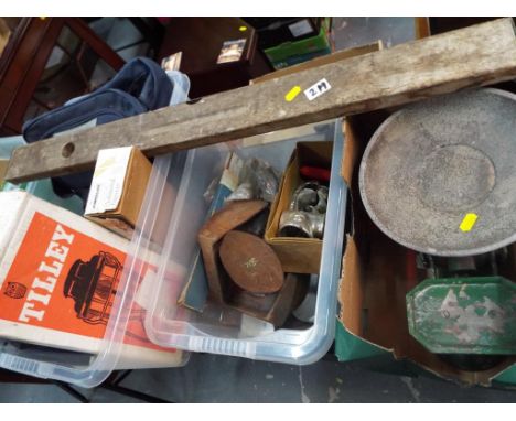 Three boxes containing a mixed lot including vintage cameras, Tilley Stormlight, cast iron weighing scales, vintage tools and