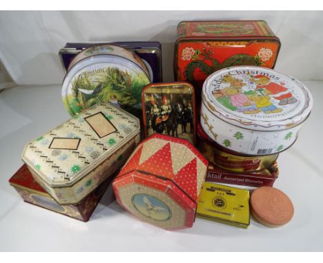 A large collection of nineteen tins including two hinged vintage tins, Royal Commemorative, Cadbury's, Hans Christian Anderse