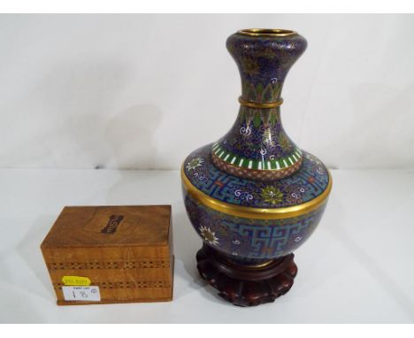 A good quality cloisonne vase approximate height 22 cm and a vintage box containing two sets of playing cards (2)