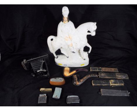 A good lot to include five vintage cigarette lighters including Ronson and similar, four cut-throat razors, a vintage Kodak f