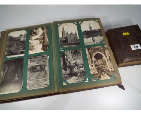 A mid nineteenth century French embossed leather photograph album with gold leaf edged pages (16 cm x 13 cm x 5 cm) containin