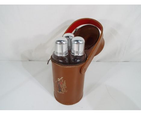 A three spirit glass flask set, brown leather marked Beefeater