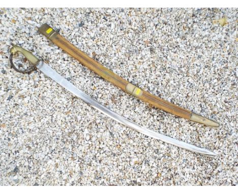 An Indian sword in scabbard, overall length in scabbard 92 cm Est £20 - £40