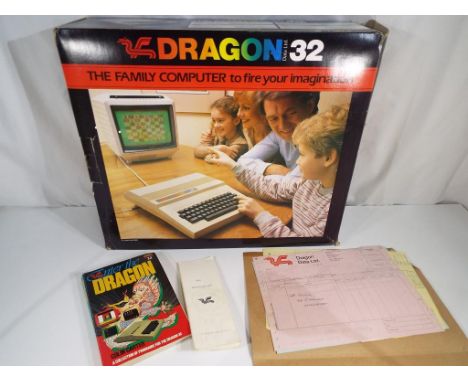 Dragon 32 - A early family computer by Dragon 32 with instruction leaflet and books in original book