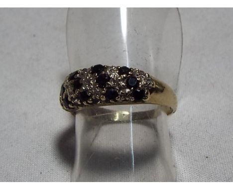 A lady's 9ct gold, sapphire and diamond cluster ring, approx weight 1.8 grams, size K½ boxed Est £20 - £40