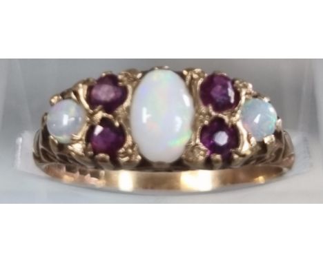 9ct gold opal and ruby ring.  1.8g approx.  Size M1/2.   (B.P. 21% + VAT) 