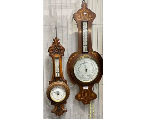 Edwardian style mahogany inlaid aneroid barometer marked W G Whiting Manchester together with an early 20th century carved oa