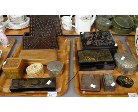 Two trays of various mostly oriental design boxes to include: repousse copper box with oriental figural design, small chrysan