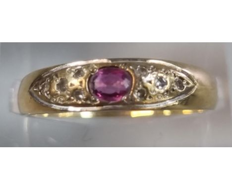 9ct gold diamond and ruby ring.  1.5g approx.  Size O.   (B.P. 21% + VAT) 