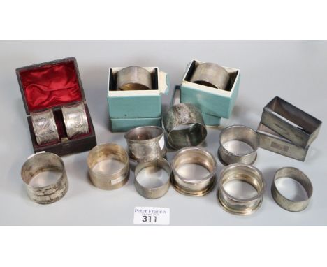 Large collection of silver engine turned and other napkin rings.  12.5 troy oz approx.   (B.P. 21% + VAT) 