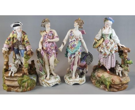 Collection of 19th century Sitzendorf and similar continental porcelain figurines to include: semi-nude maiden with peacock, 