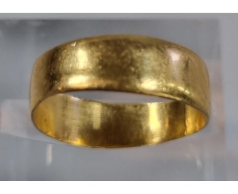 22ct gold wedding band.  2.1g approx.  size K.   (B.P. 21% + VAT) 