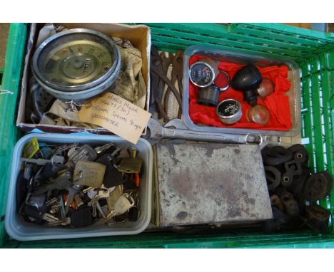 Crate containing various automobilia including; vintage 60's Morris Minor original Smith's speedometer, various car keys, oth