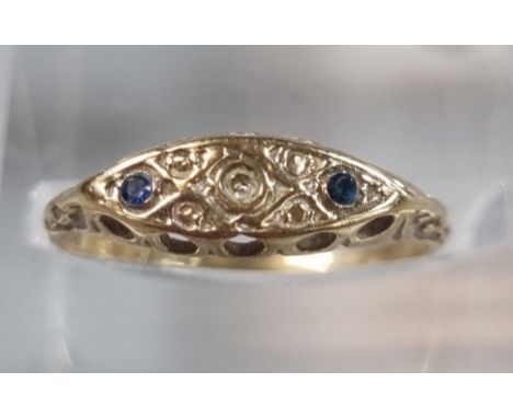 9ct gold and sapphire ring with small diamond chip.  0.8g approx.  Size K.  (B.P. 21% + VAT) 