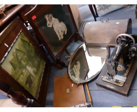 Two mid 20th century oak framed fire guards one with inset tapestry of a dog, a Beaver Swift book press, a Vickers sewing mac