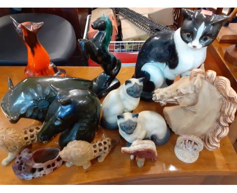 A Goebel model of a cat, 28cm high, a Mexican pottery bull and other ornamentsLocation: A1F 
