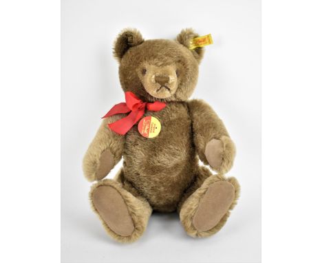 A light brown Steiff jointed original Teddy Bear 'Knopf Im OHR', no. 0202/26, with growler, hand stitched nose, button tag an