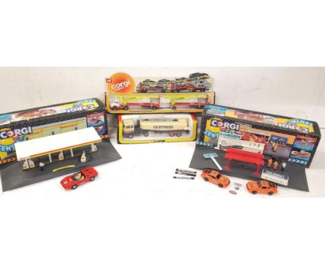 Boxed Corgi items to include two Corgi Centre sets, an MOT centre and Shell service station, together with a boxed Corgi Supe