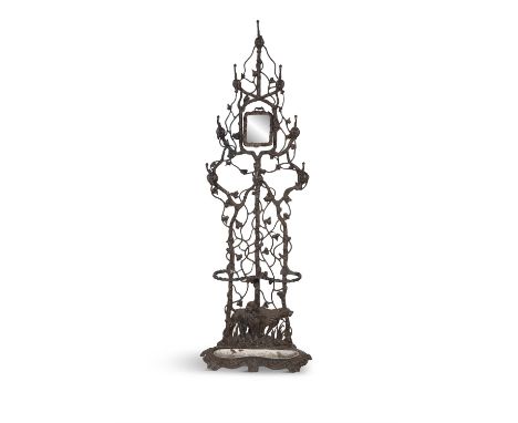 A VICTORIAN CAST IRON COAT AND UMBRELLA STAND, LATE 19TH CENTURY, in the form of ivy issuing hooks centred by a mirror above 