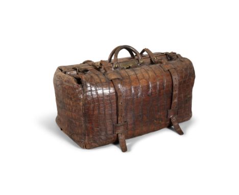 *A LARGE VINTAGE ALLIGATOR SKIN GLADSTONE TRAVELLING BAG, with twin handles and concertina action opening, fitted staps and b