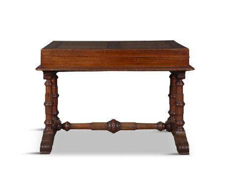 A VICTORIAN WALNUT BAGATELLE TABLE, the out folding top revealing a baise lined game interior, raised twin fluted and turned 