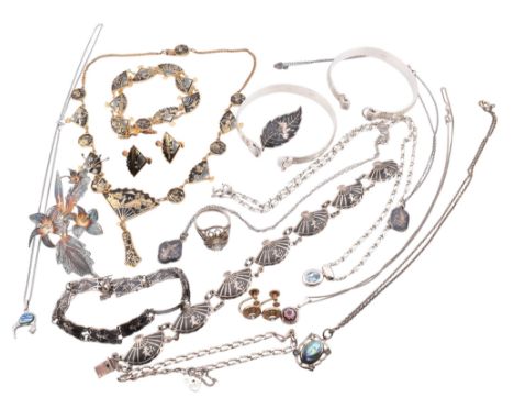 A collection of silver and costume jewellery. The lot to include a pair of rolled gold and blue stone screwback earrings, mar