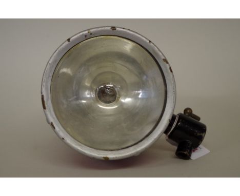 A vintage Stadium 'Auto Spoolyte' headlamp, circa 1930s, with 4in lens and&nbsp;mirror to reverse, (repainted). 