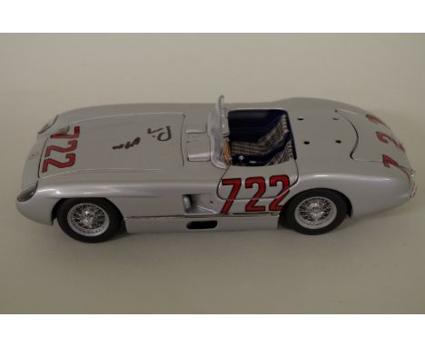 A Minichamps 1:24 scale '1955 Mercedes Benz 300SL Mille Miglia', signed by Stirling Moss, boxed. 