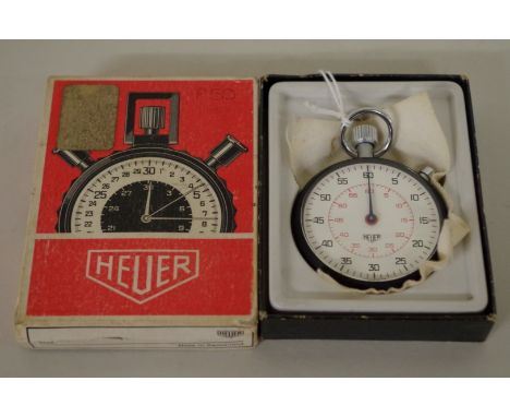 A 1960s Heuer 60 second chronograph, with single button and concentric minute dial, in original box. 