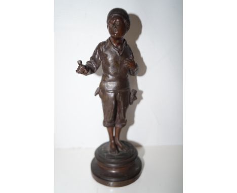 Late 19th century spelter figure with plaque to base ''Apres ma i ere pipe par berthoz'' Height 27 cm