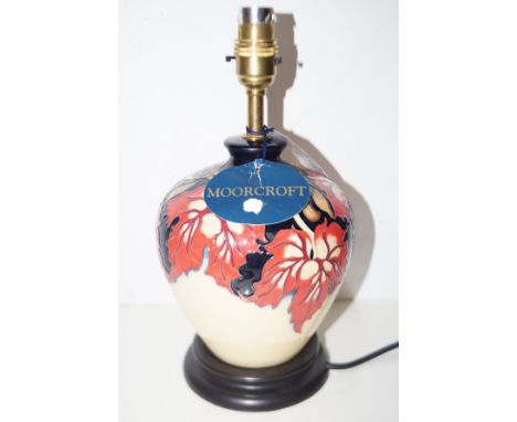 Moorcroft table lamp in the October falling leaves pattern Overall height 31 cm