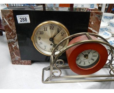 2 mantel clocks.