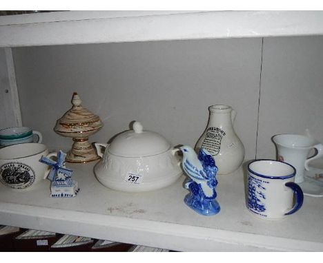 A shelf of miscellaneous china etc.,