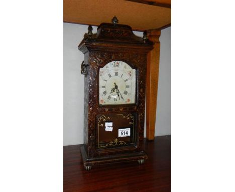 A mantel clock,.
