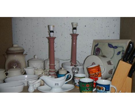 A shelf of kitchen items,.