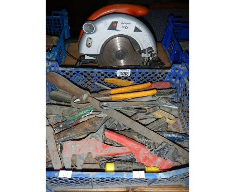 A circular saw and a box of tools.