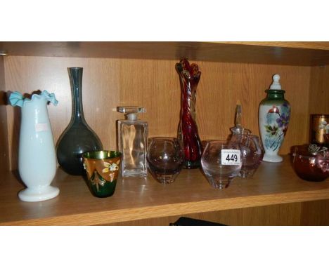 A shelf of glass ware.