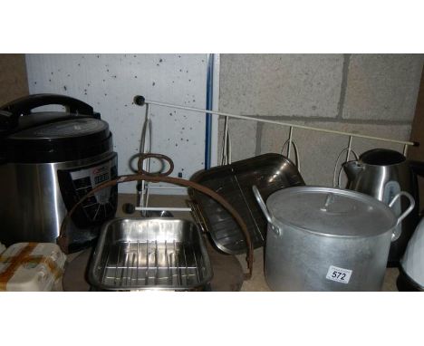 A shelf of kitchen items.