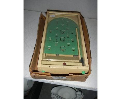 A vintage Chad Valley mini bagatelle game.