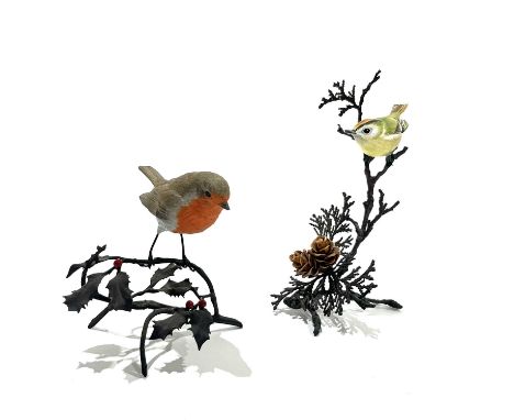 Two ceramic birds perched atop bronzed metal branches, a Coalport robin, and an unmarked Goldcrest (2)