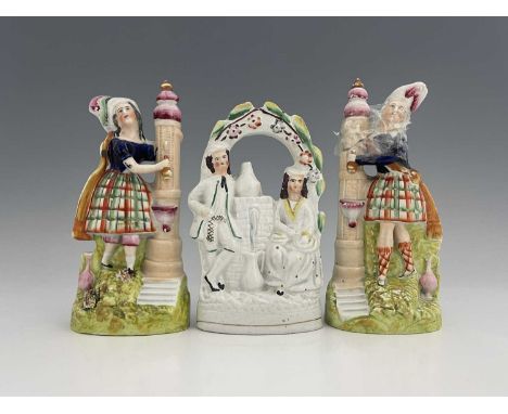 Staffordshire temperance figures collecting water from a fountain, circa 1860, figures modelled as a boy and girl in Scottish