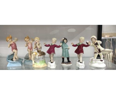 F G Doughty for Royal Worcester, seven figures from the Months of the Year series, including January, February June, July and
