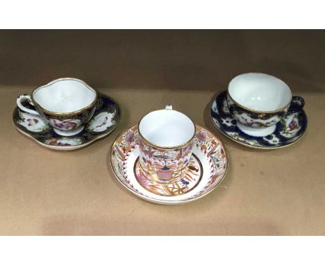 A Spode coffee can and saucer alongside 2 decorative cups and suacers with insects and birds decoration (6)