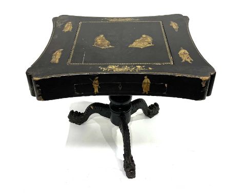 A Chinese black lacquered and gilt games table, Qing Dynasty, inverted top decorated with gilt figures in traditional costume